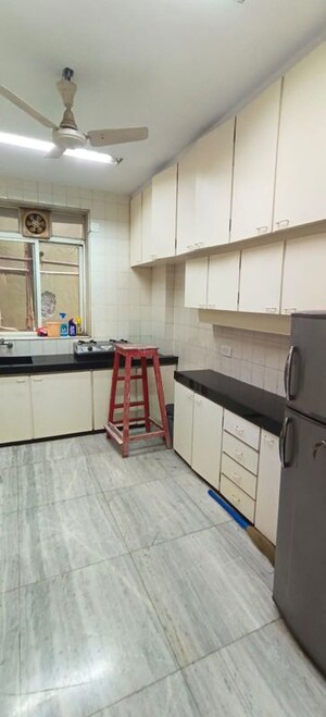 Kitchen in 1 BHK Apartment at Daulat Shirin CHS, Colaba – for Sale