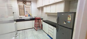 Kitchen in 1 BHK Apartment at Daulat Shirin CHS, Colaba – for Sale