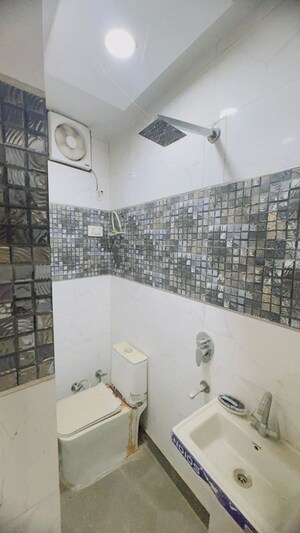 Bathroom in 3 BHK Builder Floor at Dwarka Mor – for Sale