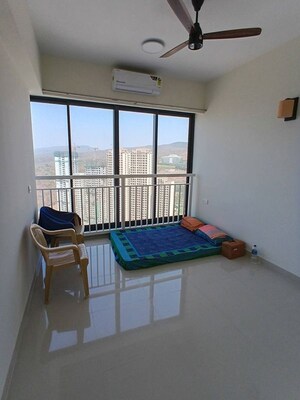 Bedroom in 2 BHK Apartment at Dynamix Divum, Malad East – for Rent