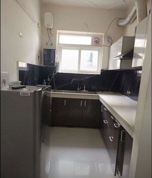 Kitchen in 2 BHK Apartment at Motia Royal Citi Apartments, Ghazipur – for Rent