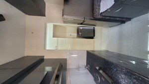 Kitchen in 1 BHK Apartment at Ashar Axis, Majiwada – for Rent