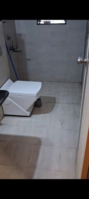 Bathroom in 3 BHK Apartment at Jangid Galaxy, Ghodbunder Road – for Rent