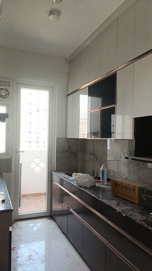 Kitchen in 2.5 BHK Apartment at Radhey Krishna Casa Green I, Sector 16 Greater Noida – for Rent