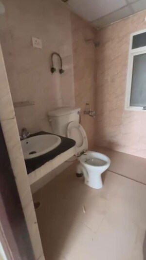 Bathroom in 3 BHK Apartment at Nimbus Express Park View, Chi V Greater Noida – for Sale