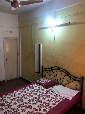 Bedroom in 3 BHK Apartment at Shivaji Co Operative Housing Society – for Rent