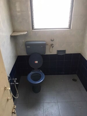 Bathroom in 3 BHK Apartment at Shivaji Co Operative Housing Society – for Rent