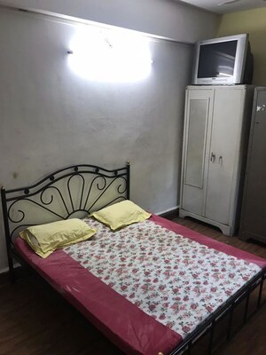 Bedroom in 3 BHK Apartment at Shivaji Co Operative Housing Society – for Rent