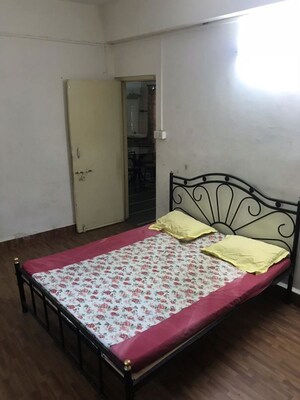 Bedroom in 3 BHK Apartment at Shivaji Co Operative Housing Society – for Rent