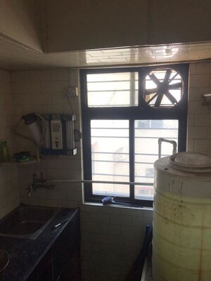 Kitchen in 3 BHK Apartment at Shivaji Co Operative Housing Society – for Rent