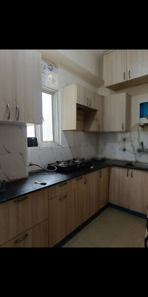 Kitchen in 3.5 BHK Apartment at Supertech Cape Town, Sector 74 – for Rent