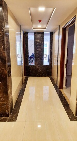Building Lobby in 1 BHK Apartment at Raunak Unnathi Woods, Ghodbunder Road – for Sale