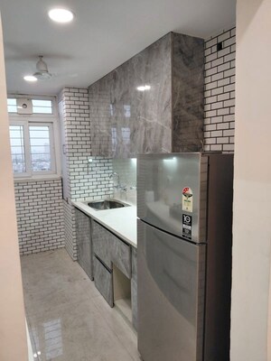 Kitchen in 2 BHK Apartment at Aditya Mega City, Vaibhav Khand – for Sale