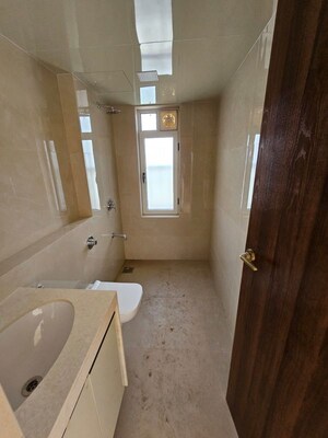 Bathroom in 1 BHK Apartment at Aplite Sapphire, Grant Road East – for Sale