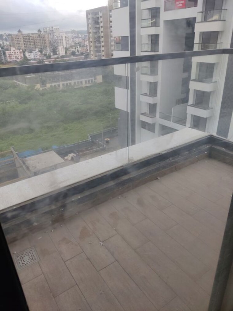 Balcony, majestique-signature-towers 2 Bedroom 1000 Sq.Ft. Apartment In Balewadi Pune 10330151