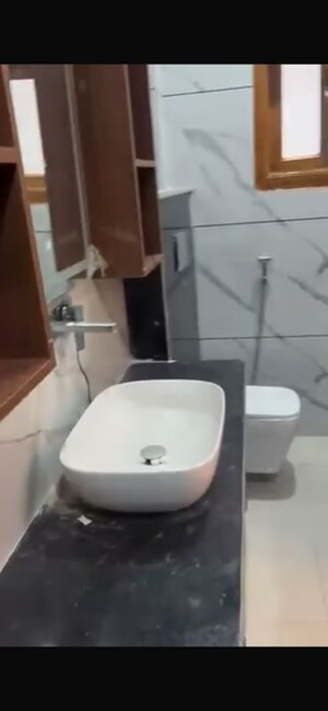 Bathroom in 1 RK Apartment at Omaxe NRI City Apartments, Omega Ii Greater Noida – for Rent