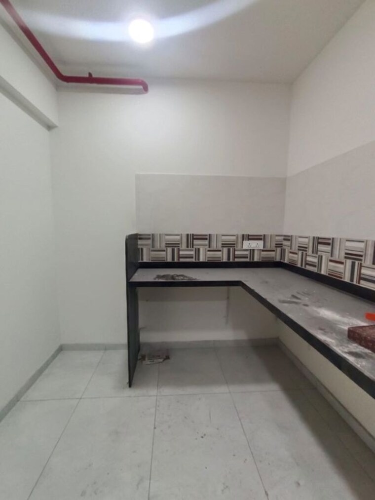 Kitchen, mantra-meraki 2 Bedroom 1100 Sq.Ft. Apartment In Akurdi Pune 10330272