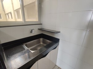 Kitchen in 2 BHK Apartment at Yashwin Supernova, Wakad – for Sale