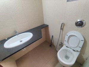 Bathroom in 2 BHK Apartment at Yashwin Supernova, Wakad – for Sale