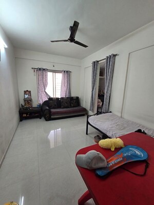 Living Room in 1 BHK Apartment at Gulmohor Imperial, Dhayari – for Sale