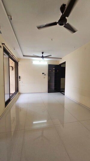 Living Room in 2 BHK Apartment at Gami Reagan, Ghansoli – for Rent