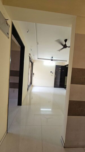 Living Room in 2 BHK Apartment at Gami Reagan, Ghansoli – for Rent