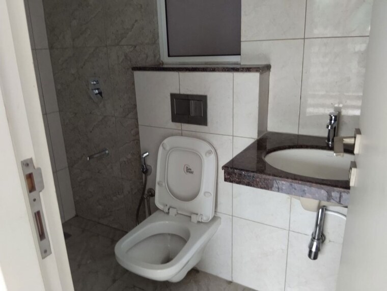 Bathroom, godrej-boulevard 2 Bedroom 750 Sq.Ft. Apartment In Manjari Pune 10330652