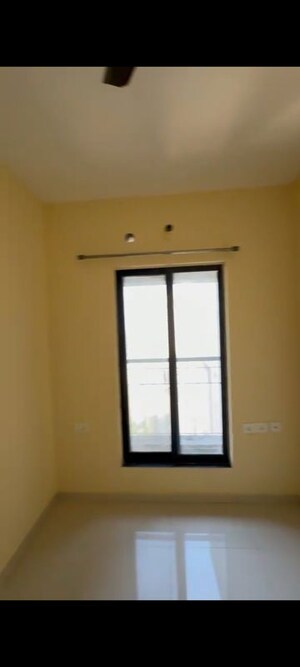 Living Room in 1 BHK Apartment at Dosti Desire, Brahmand – for Rent