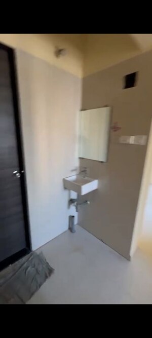 Bathroom in 1 BHK Apartment at Dosti Desire, Brahmand – for Rent