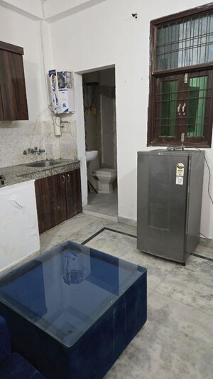 Kitchen in 1.5 BHK Builder Floor at Freedom Fighters Enclave – for Rent