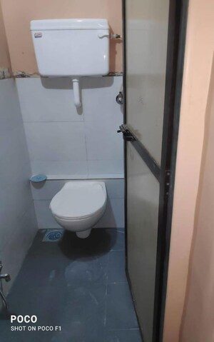 Bathroom in 1 BHK Apartment at Tilak Nagar – for Sale