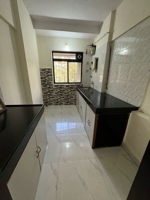 Kitchen in 2 BHK Apartment at Poorti Vihar CHS, Goregaon West – for Sale