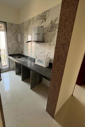 Kitchen in 2 BHK Apartment at Paradise Sai World Empire, Kharghar – for Rent
