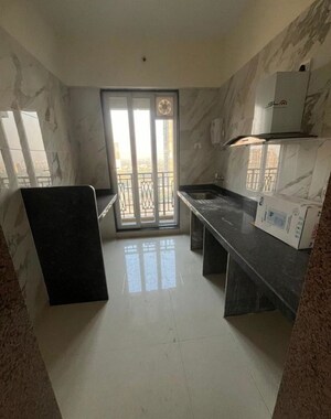 Kitchen in 2 BHK Apartment at Paradise Sai World Empire, Kharghar – for Rent