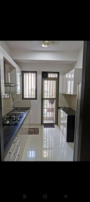 Kitchen in 2 BHK Apartment at Lodha Luxuria, Majiwada – for Rent