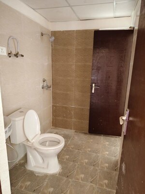 Bathroom in 2.5 BHK Apartment at Mahagun My Woods, Sector 16c Greater Noida – for Sale