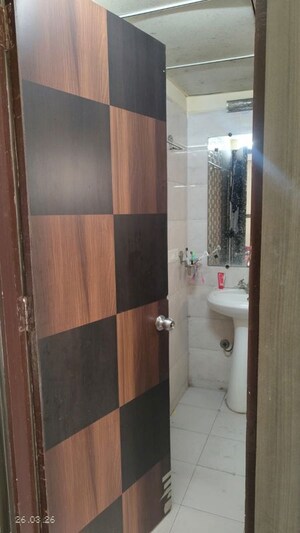 Bathroom in 2.5 BHK Apartment at Mahagun My Woods, Sector 16c Greater Noida – for Sale