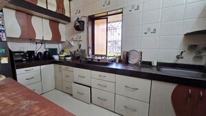 Kitchen in 2 BHK Apartment at Kotecha Apartment, Malad West – for Rent