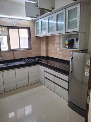 Kitchen in 1 BHK Apartment at Suyog Nisarg, Wagholi – for Rent