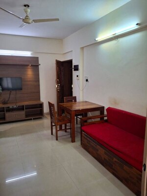 Living Room in 1 BHK Apartment at Suyog Nisarg, Wagholi – for Rent