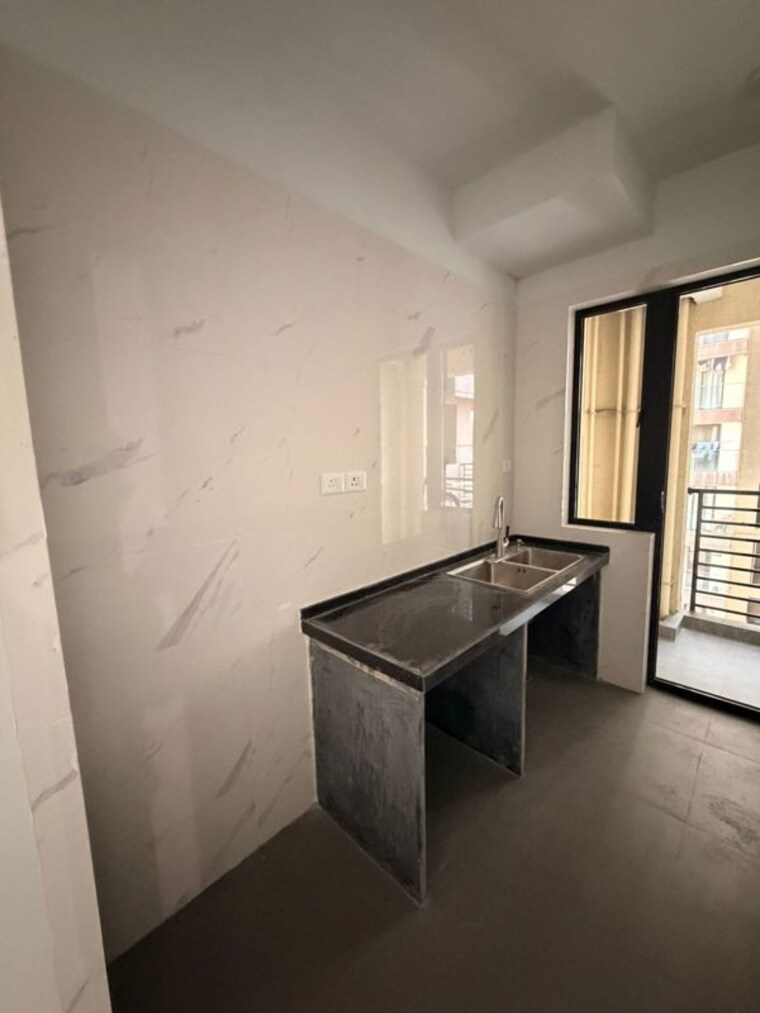 Kitchen, risland-the-icon 2 Bedroom 775 Sq.Ft. Apartment In Dhokali Thane 10331144
