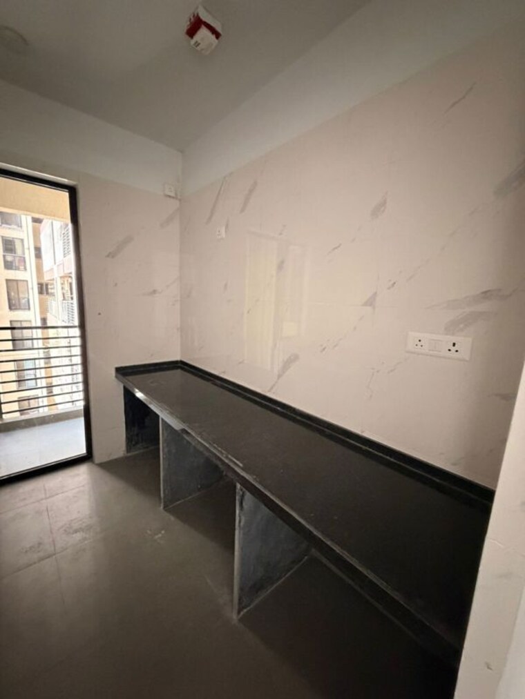 Kitchen, risland-the-icon 2 Bedroom 775 Sq.Ft. Apartment In Dhokali Thane 10331144