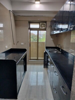 Kitchen in 2 BHK Apartment at Sheth Vasant Oasis, Andheri East – for Rent