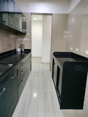 Kitchen in 2 BHK Apartment at Sheth Vasant Oasis, Andheri East – for Rent