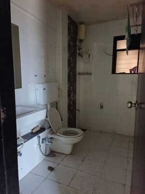 Bathroom in 2 BHK Apartment at Runwal Pearl, Manpada – for Rent