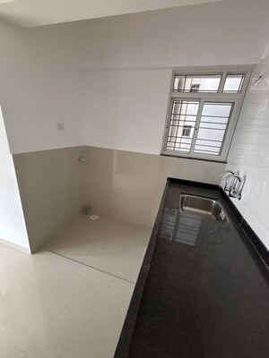 Kitchen in 2 BHK Apartment at Goyal My Home MH 14, Punawale – for Rent