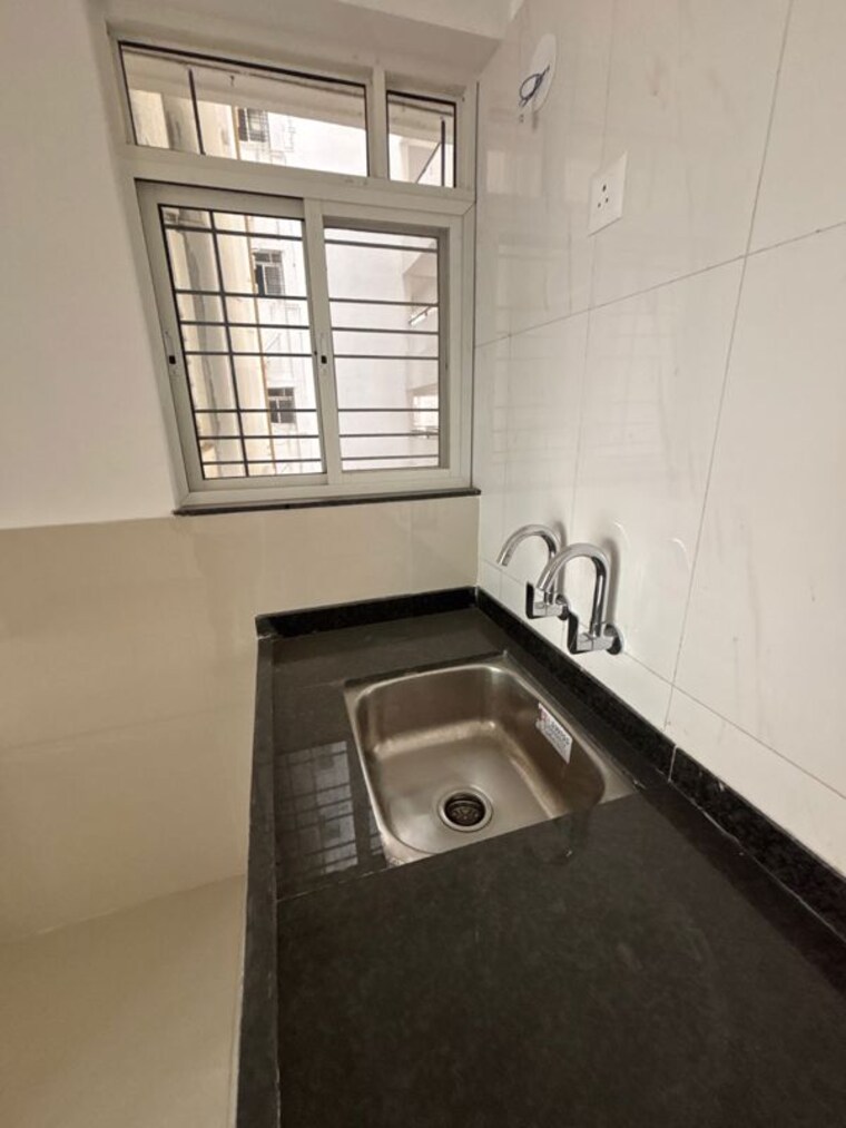 Kitchen, goyal-my-home-mh-14 2 Bedroom 725 Sq.Ft. Apartment In Punawale Pune 10331464