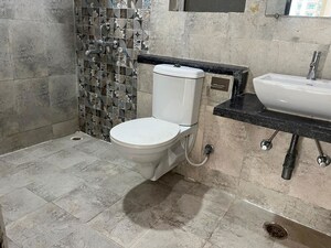 Bathroom in 2.5 BHK Apartment at Mahagun Mirabella Highrise, Sector 79 – for Rent