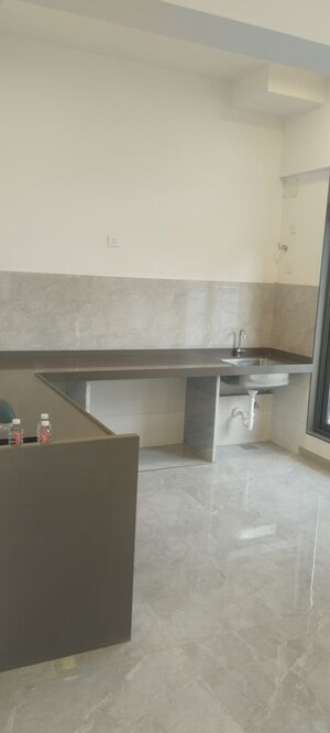 Kitchen in 2 BHK Apartment at Neelkanth Greens, Manpada – for Sale