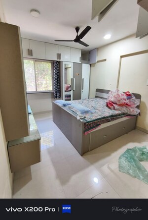 Bedroom in 2 BHK Apartment at Arihant Aangan, Wadgaon Sheri – for Rent